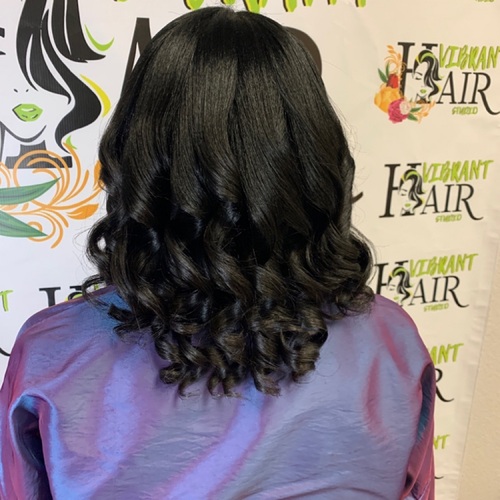 Silk press with curls 