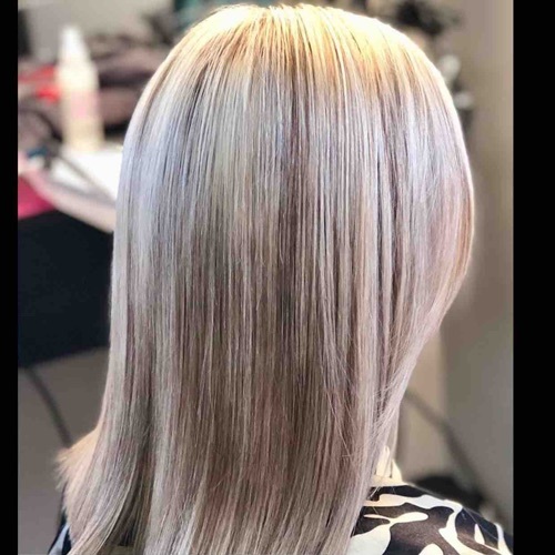 Babylites of a soft brown with a heavy blonde. Afterwards a Keratin Treatment! Highly recommended after any color service. Provides unsurpassed frizz control, adds amazing shine and a humidity barrier for up to 4-6 weeks. 