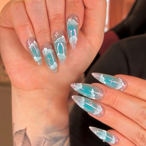 Clear almond acrylics with icy blue chrome encapsulated inside