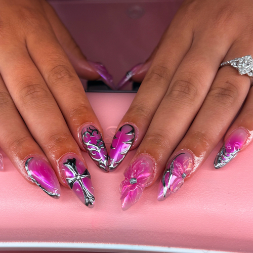 Pink and magenta almond acrylics with hearts, butterflies and chrome