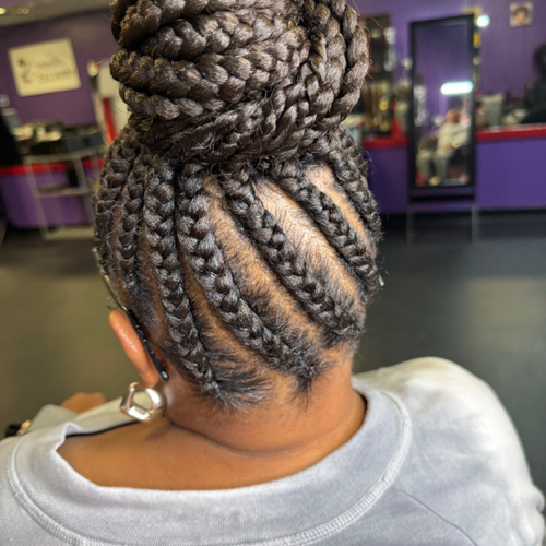 Braids in a ponytail bun up 