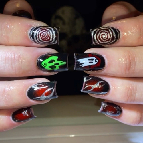 Short black acrylics with red flames, spirals and a ghost for Halloween