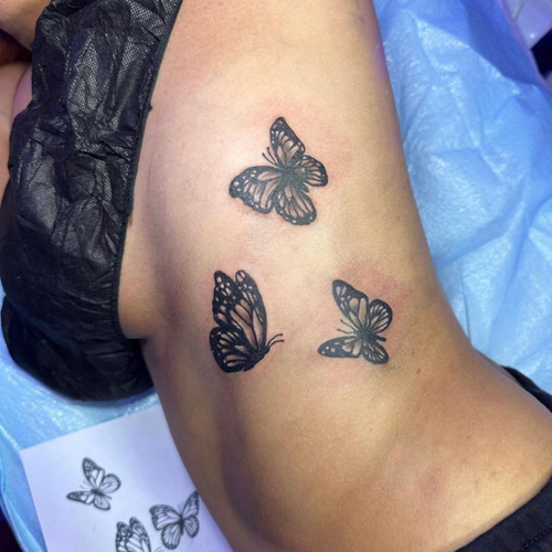 3 butterflies on ribs // Black and Grey Shading w white highlights