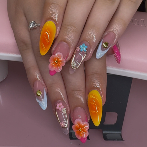 Almond acrylics with an orange sunset, 3D flowers and chrome swirls