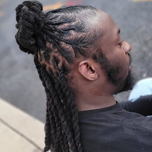 Half Up Half Down loc style with two strand twist in the back 