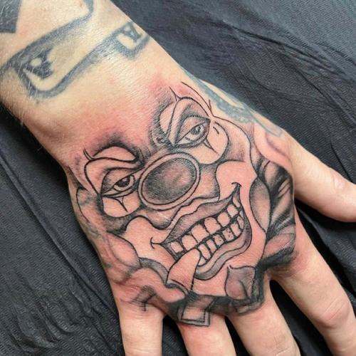 ClownFace on hand
Black and grey shading