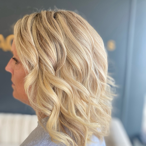 Full head of highlights and lowlights. I-tip extensions installed in front sections to add fullness. 
