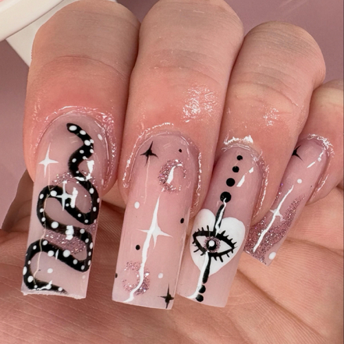 Long square nude acrylics with black-and-white snake, star and eye line art