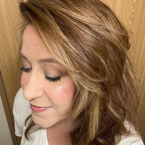 Client Selfies Rock! 
Pop of Color Blonde and warm Auburn tones with a layered haircut!