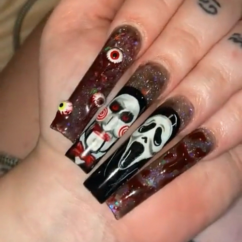 Extra-long coffin acrylics with hand-painted horror movie characters