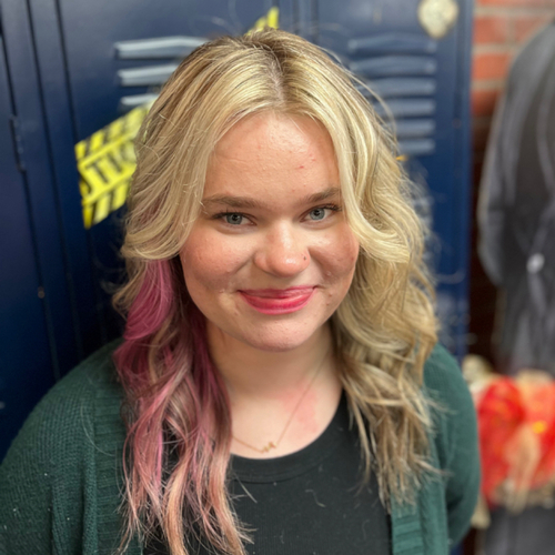 Refreshed Blonde around her face, then iron Styled it!