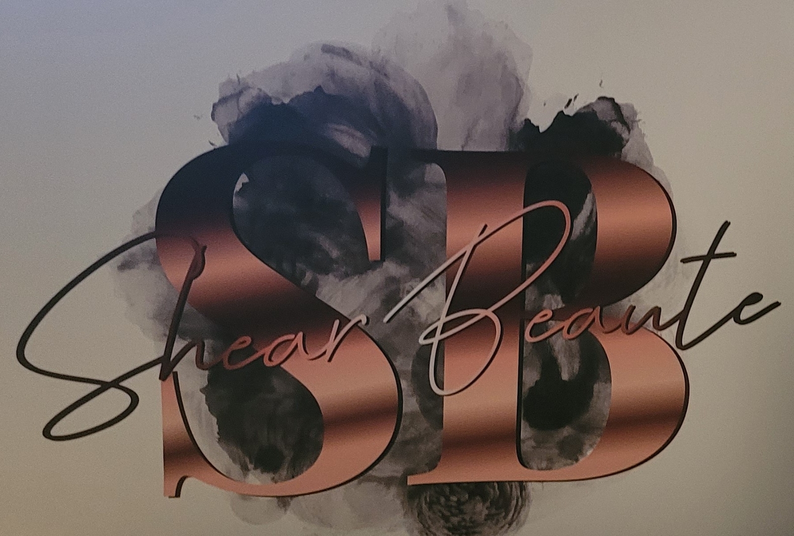 Clean, professional medical spa treatment room with neutral tones at Shear Beaute LLC Hair n Nail Studio and spa in Cheyenne