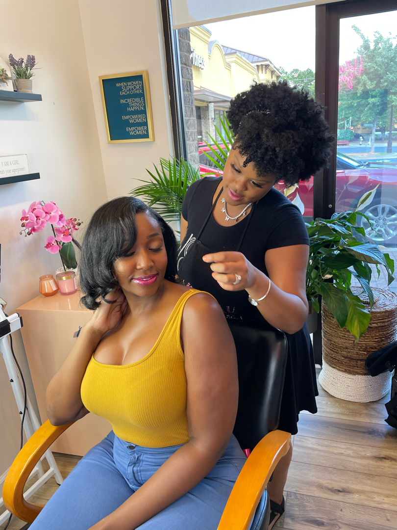 Sleek, shiny silk press finished on natural hair at KodakStylez in Smyrna, GA