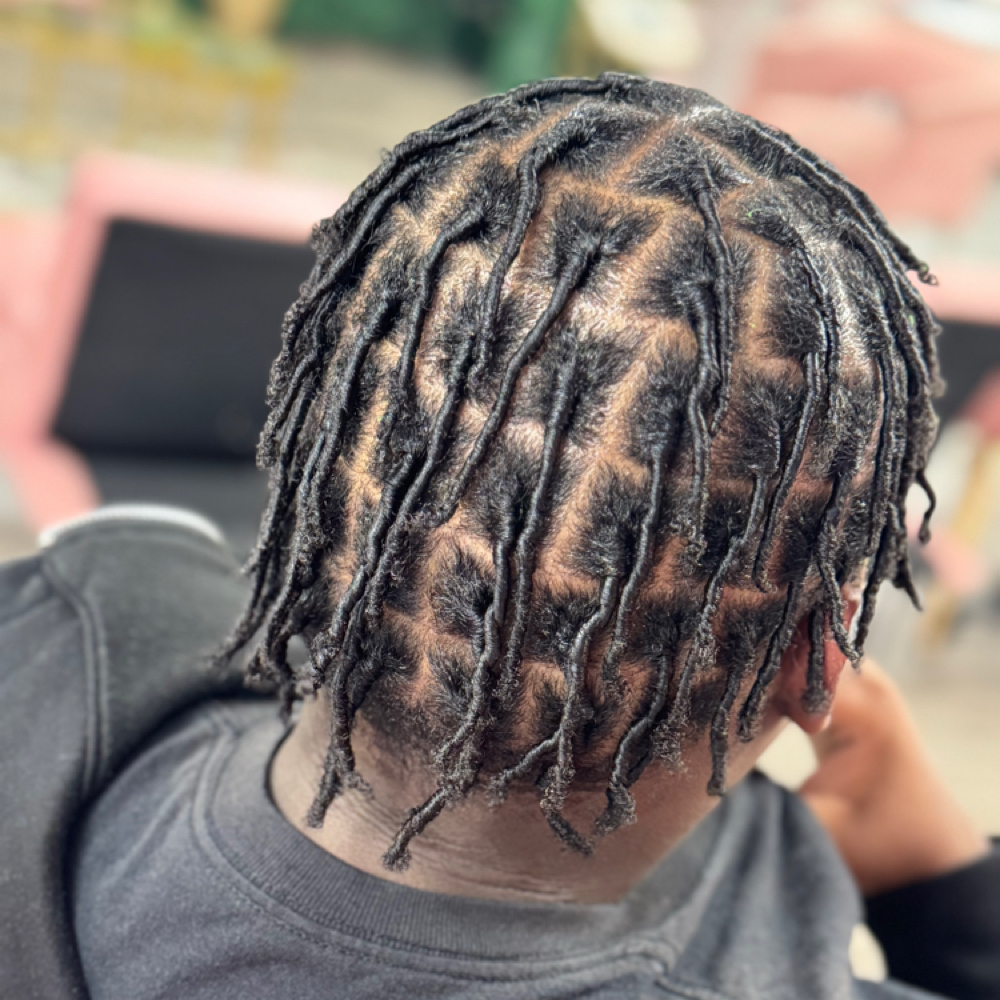 Kids Medium Coil Starter Locs at Dee Did’em in Kinston, NC