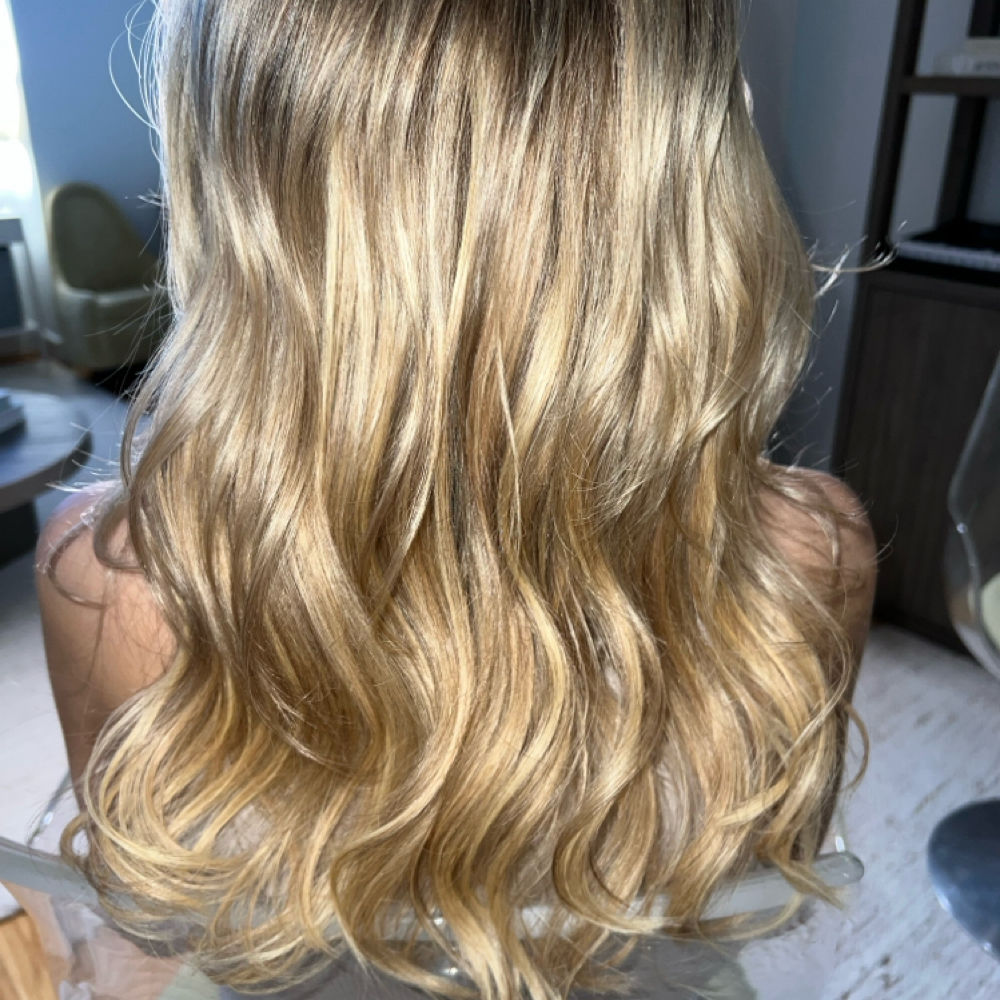Blowout With Extensions In Hair at Cut & Blow in Brooklyn, NY