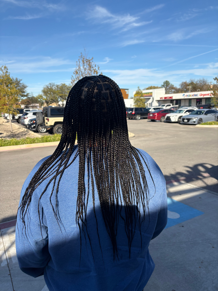 Smedium Mid Back Knotless at The Braid Studio in Arlington Tx, TX