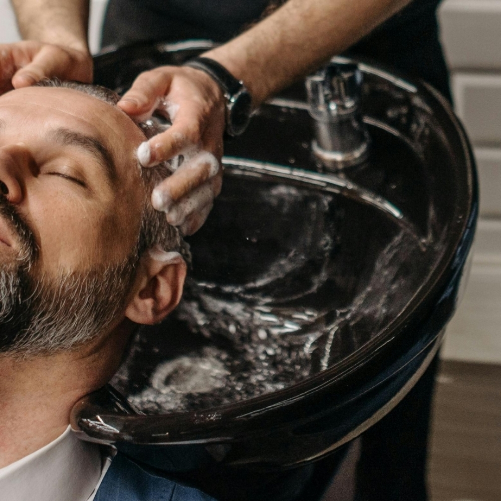Scalp treatment at Grace & Grit Barber Co in Knoxville, TN