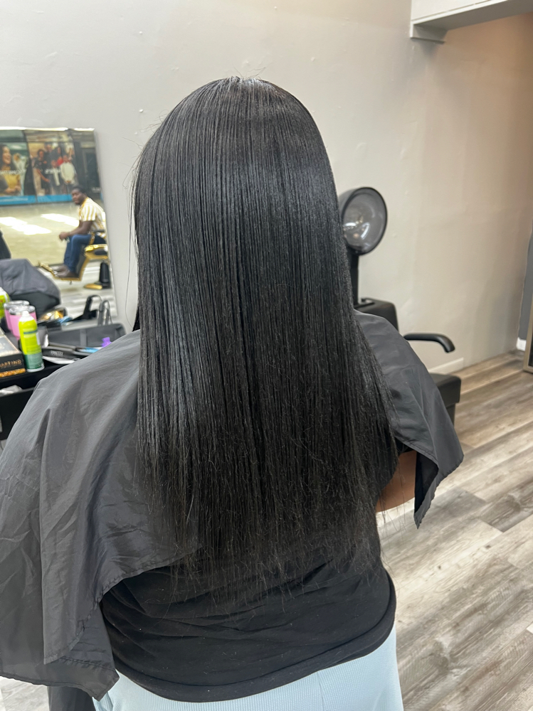 Blow Out/Silk Press at Millines Hair World, LLC in Any, FL