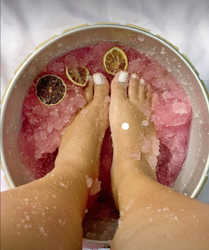 An acrylic pedicure, including Luxe