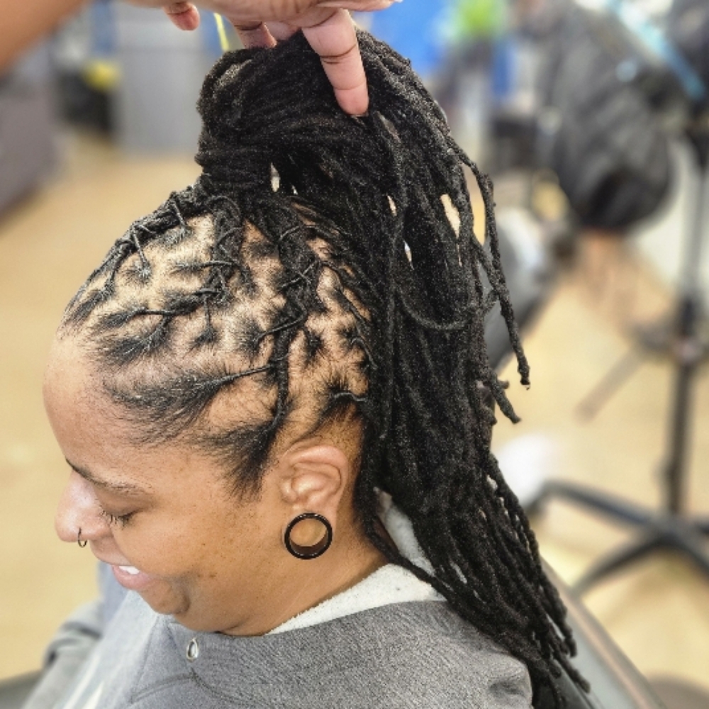 Retwist & Basic Style at Mane Attraxion Beauty in Indianapolis, IN