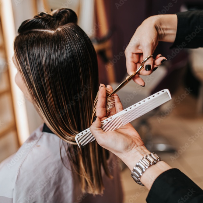 Woman's Haircut at Tommy & Co Hair Designs in Ahoskie, NC