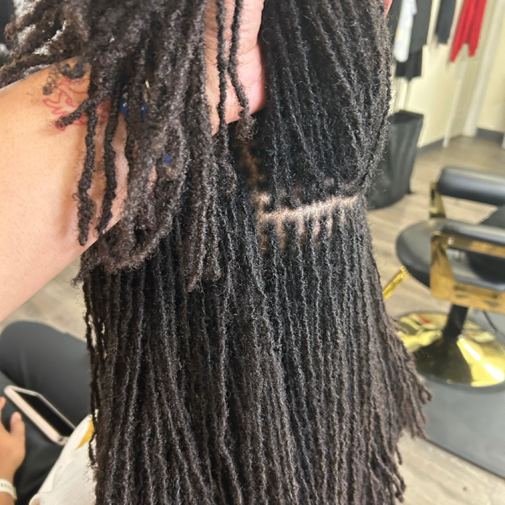 Sisterlock Retie at Via Locd Me STL in Saint Louis, MO