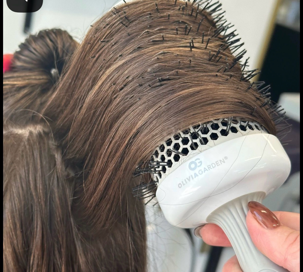 Hair cut and style at Nichole Pezan in Rockville, IN