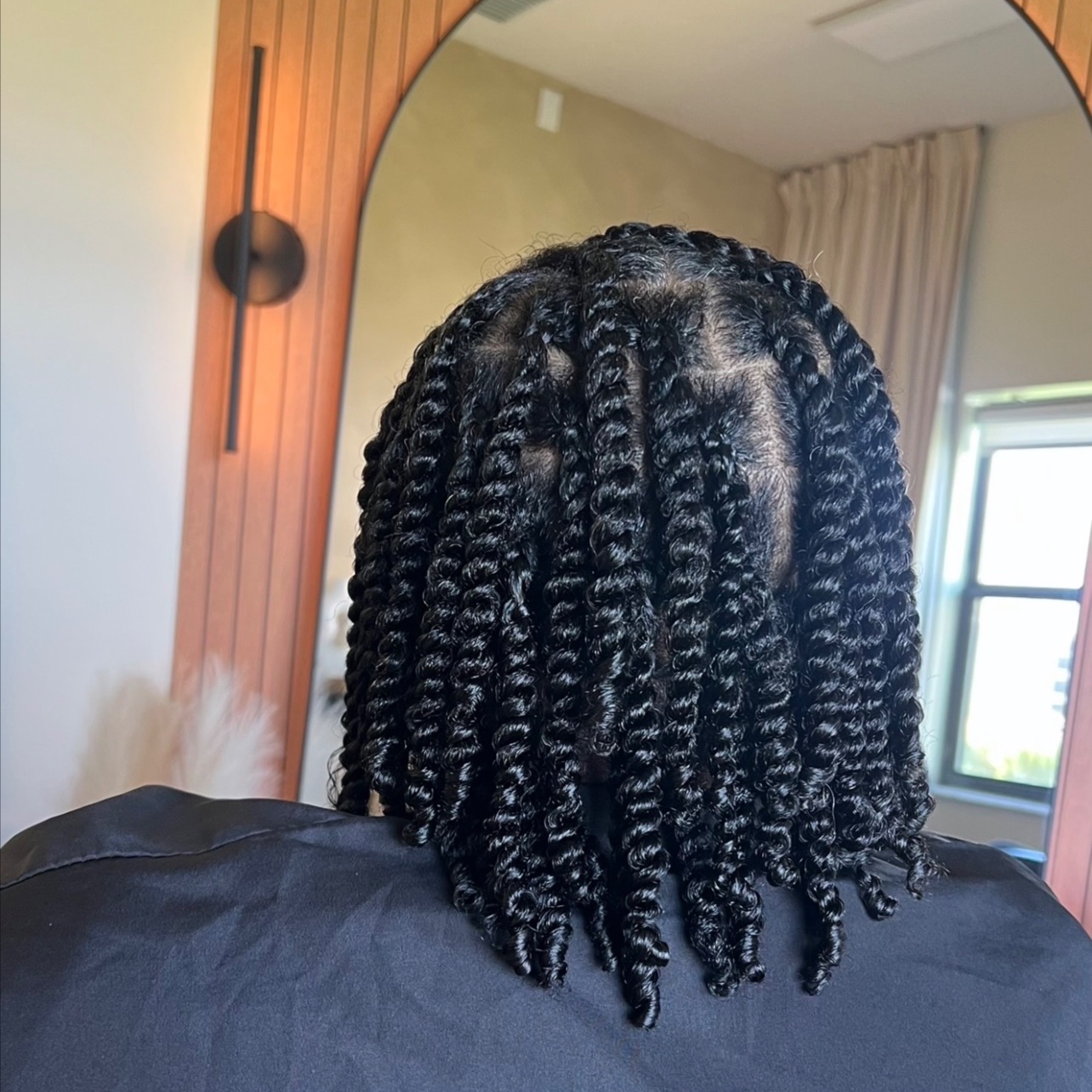 Individual two strand twist -Medium at Court Clair Hair in Lutz, FL