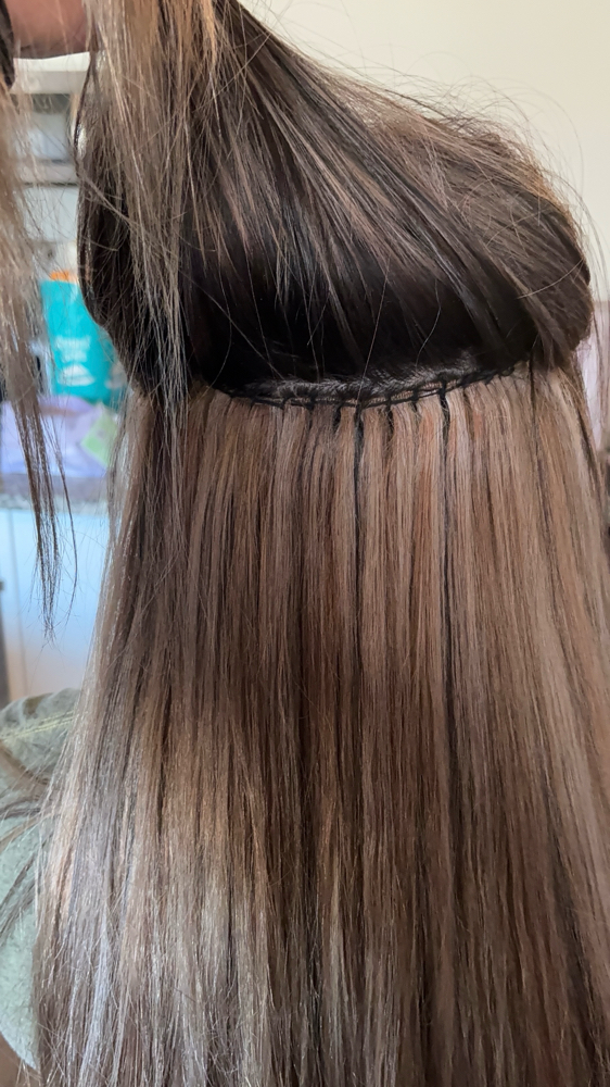 Bead In Extentions at D'Luxx Beauty in San Antonio, TX