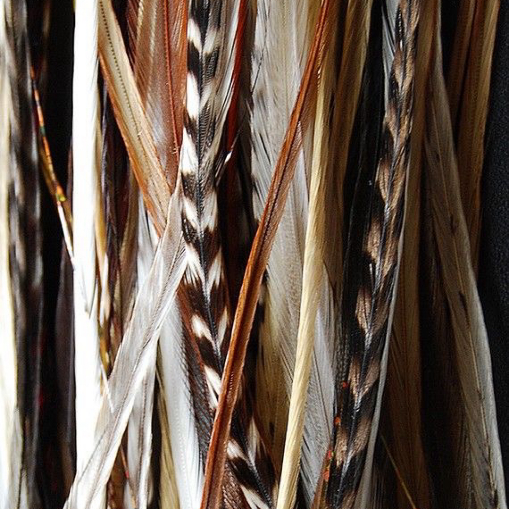 Feather Extensions at Mountain Glow Spray Tans in Skyforest, CA