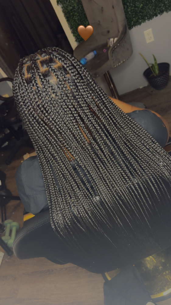 Medium Knotless Braids (mid back) at Unique’ Creationz by Jhene’ in Jacksonville, AR