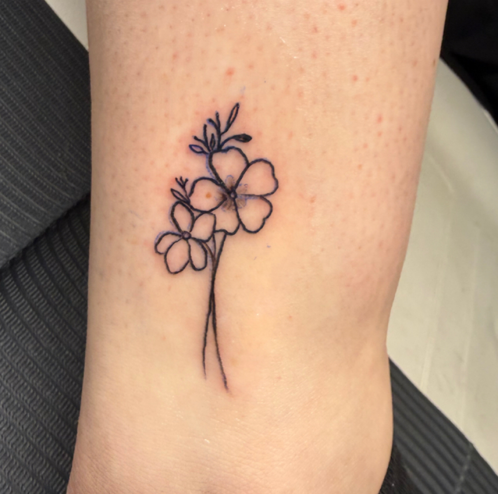 Fine Line Tattoo at The Skin Lounge in MARQUETTE, MI