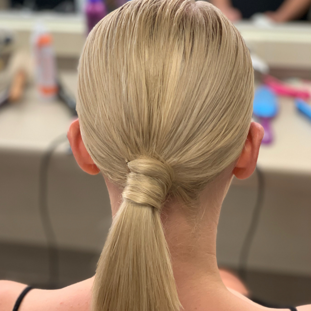 Low Bun Hairstyle at Hair Life By Charles in San Antonio, TX