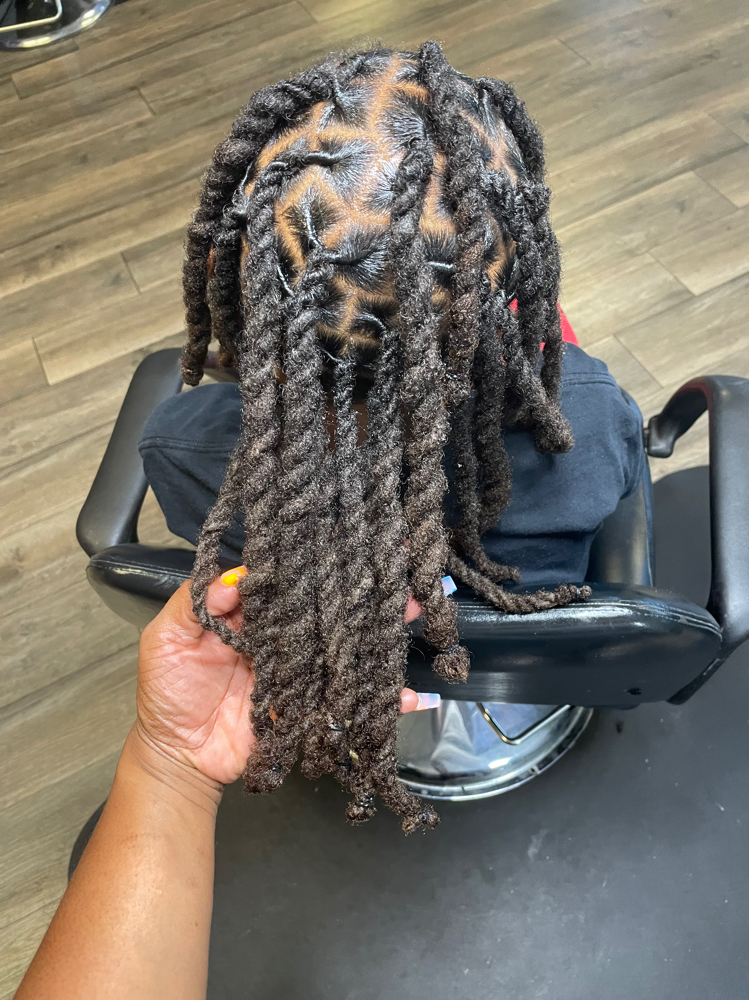 Loc maintenance two strand twist at Locd N By Yamss in Sacramento, CA