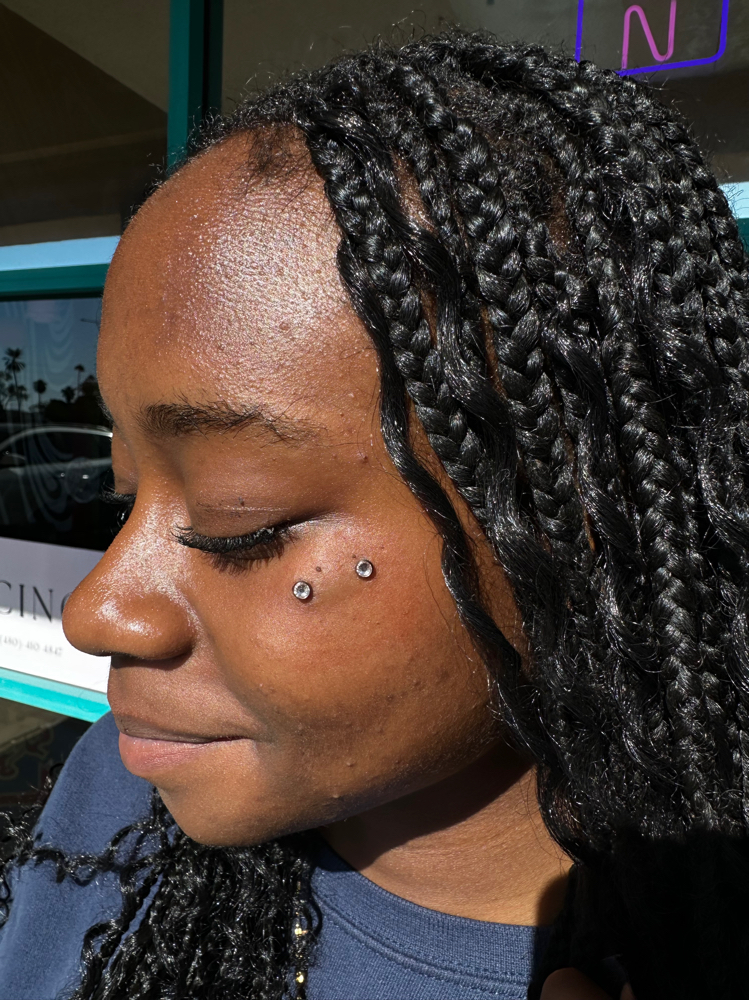 Anti-Eyebrow Piercing