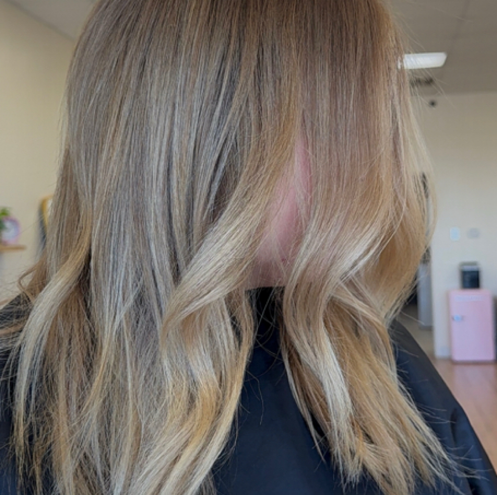 Gloss at Magnify Mane in Peoria, IL