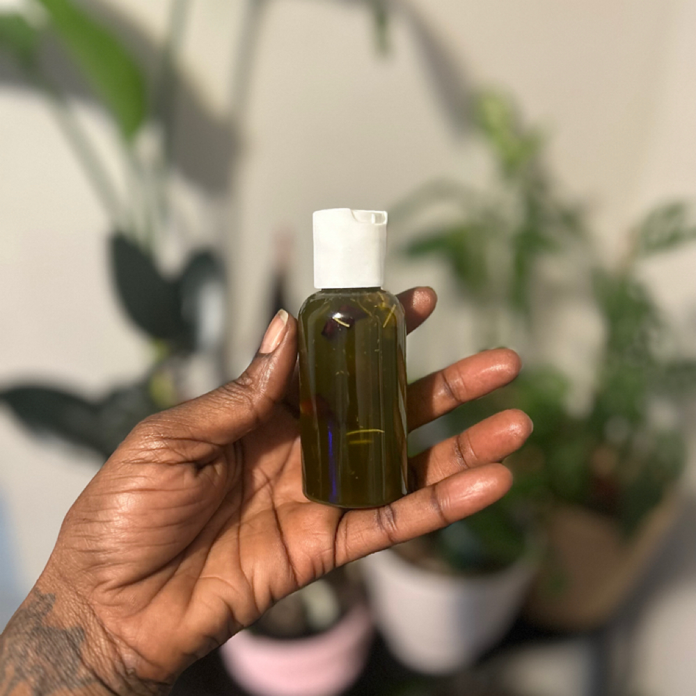 2 oz Aryuvedic Hair Oil at Braids By Jalaina in Columbus, OH