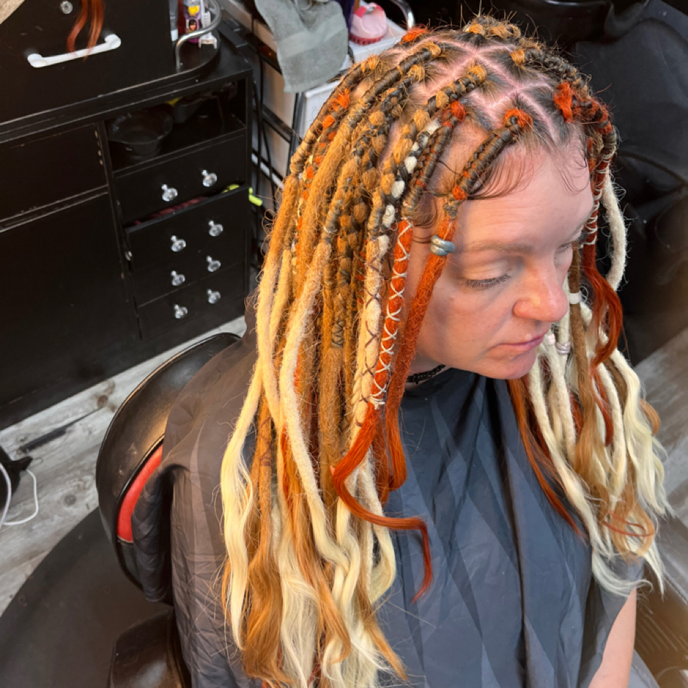 Locs Extensions at Tishabeautynhair in Lorain, OH