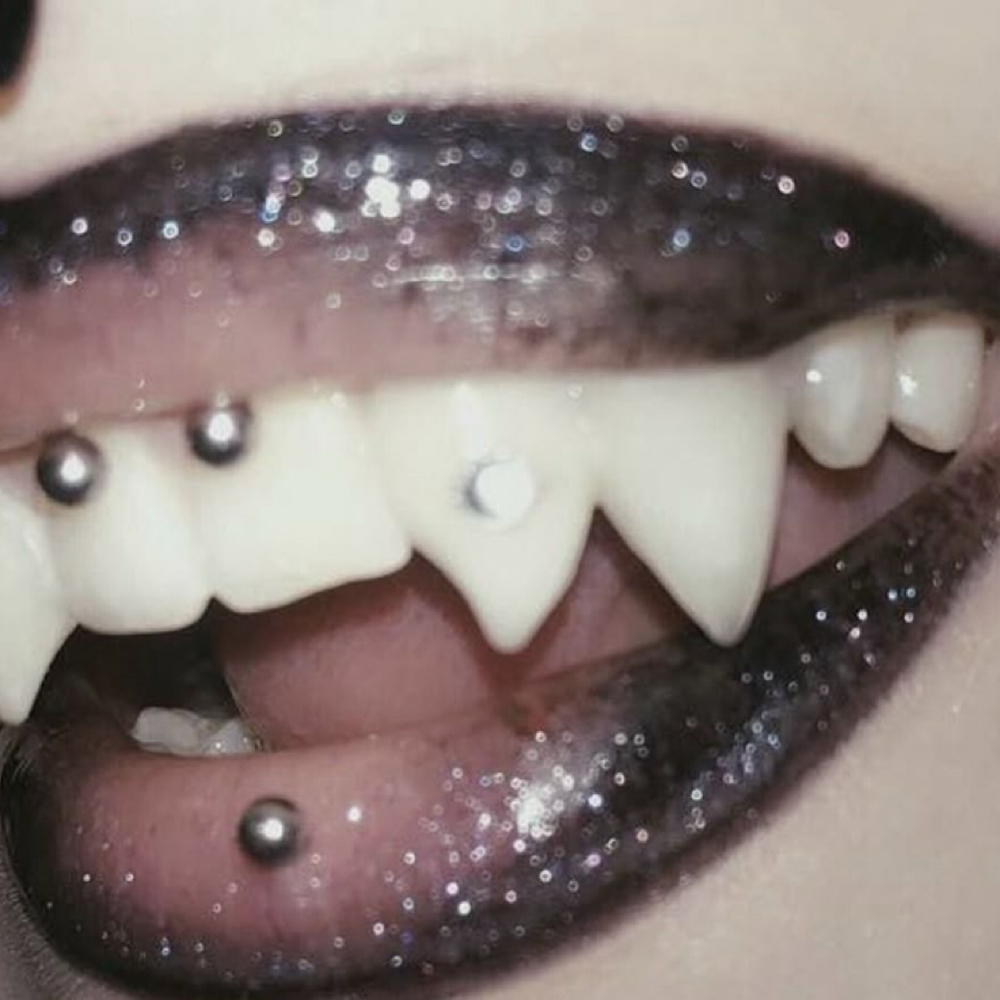 Double Tooth Gems at Femme Fatale Lash Studio in Lakewood, CO
