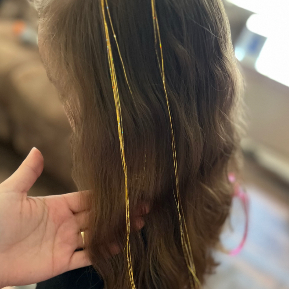 Partial Hair Tinsel (4 Strands) at Merve Hyde Beauty in San Antonio, TX