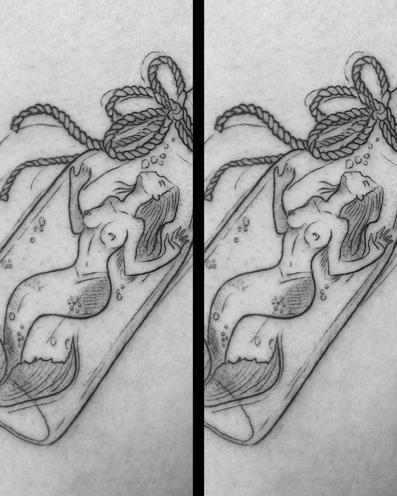 Fine Line Tattoo