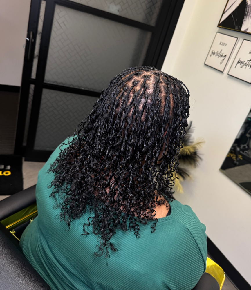 Starter Locs (long length hair) at Otusbeauty in Greenbelt, MD