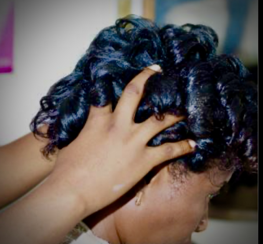 Hot Oil stimulating scalp massage at Lovelys Hair Gallery in Southfield, MI