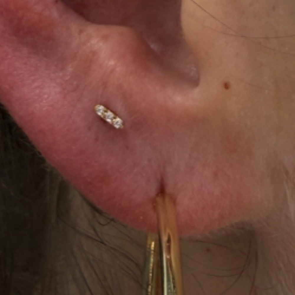 Single Lobe Piercing (or Stack) at The Mark She Made in Clovis, CA
