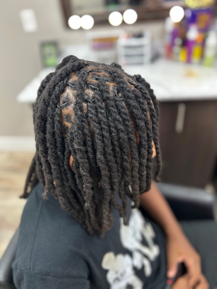 Loc Retwist & 2 Strand Twist at Ja’Tae Style Studio LLC in Euclid, OH