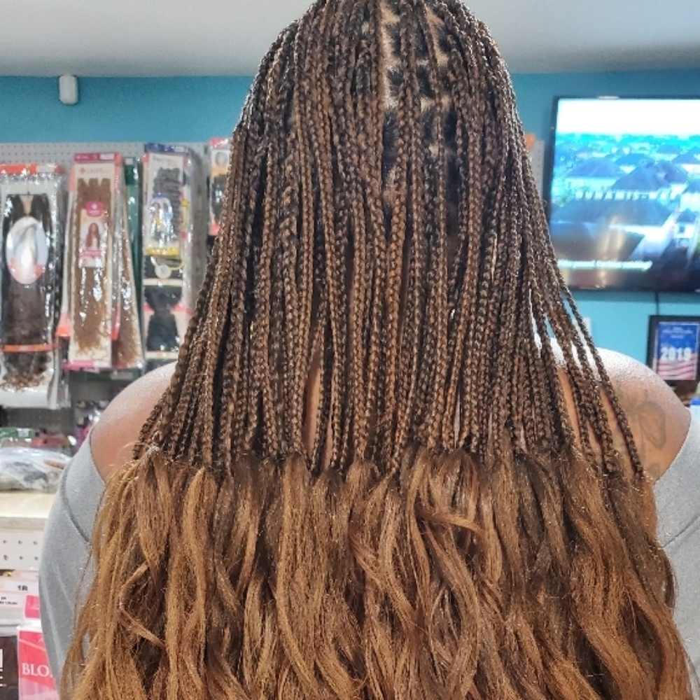 Freche Curl Braids at Djina Braiding in Grand Prairie, TX