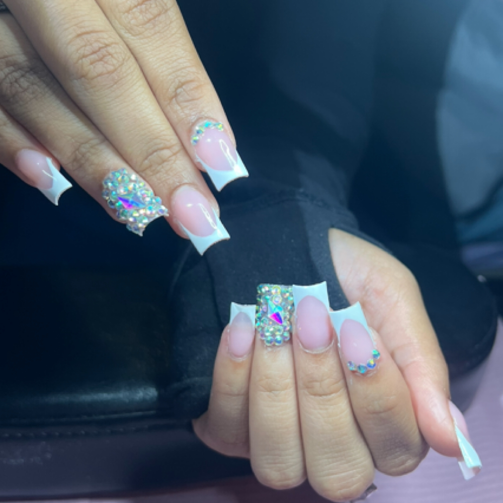Short French Tip & Blinged at Unique Nails Studio in Winston Salem, NC