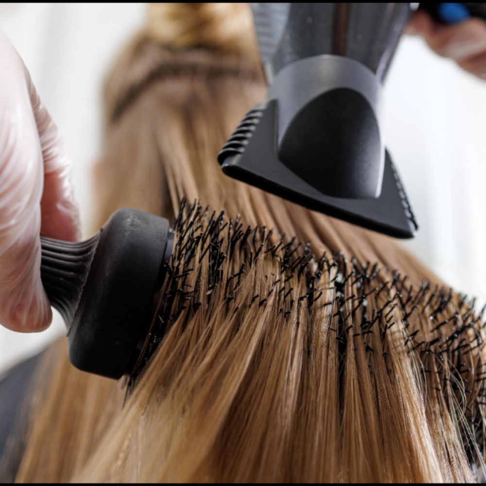 Blowout + Gloss Treatment at Jewel Beauty Lounge in Hamburg, NY