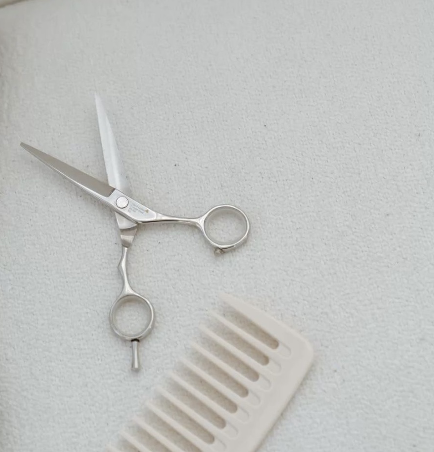 Bang Trim at Mae Hunt Hair in Orlando, FL