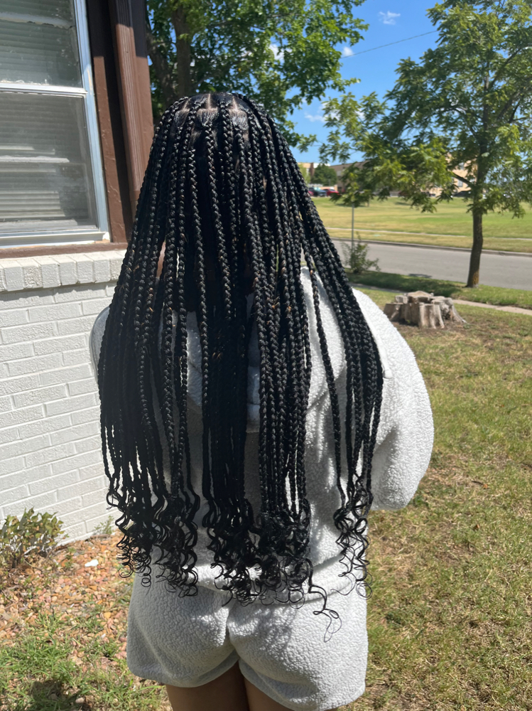 Curled Ends at BraidsByJinece in Wichita, KS